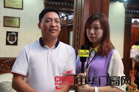 木緣尚品周謨元董事長與中華門窗網記者合影